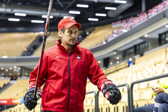 Patrick Fischer, head coach of Switzerland national ice hockey team, leaves the rink, after a Switzerland training session one day before the IIHF 2025 World Championship quarter final game against Au ...