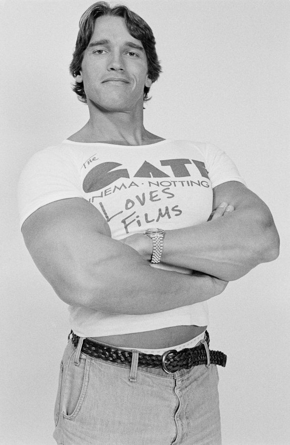 Austrian-born American actor Arnold Schwarzenegger in London to publicise the Gate Cinema in Notting Hill, 1977. (Photo by Estate Of Keith Morris/Redferns/Getty Images)