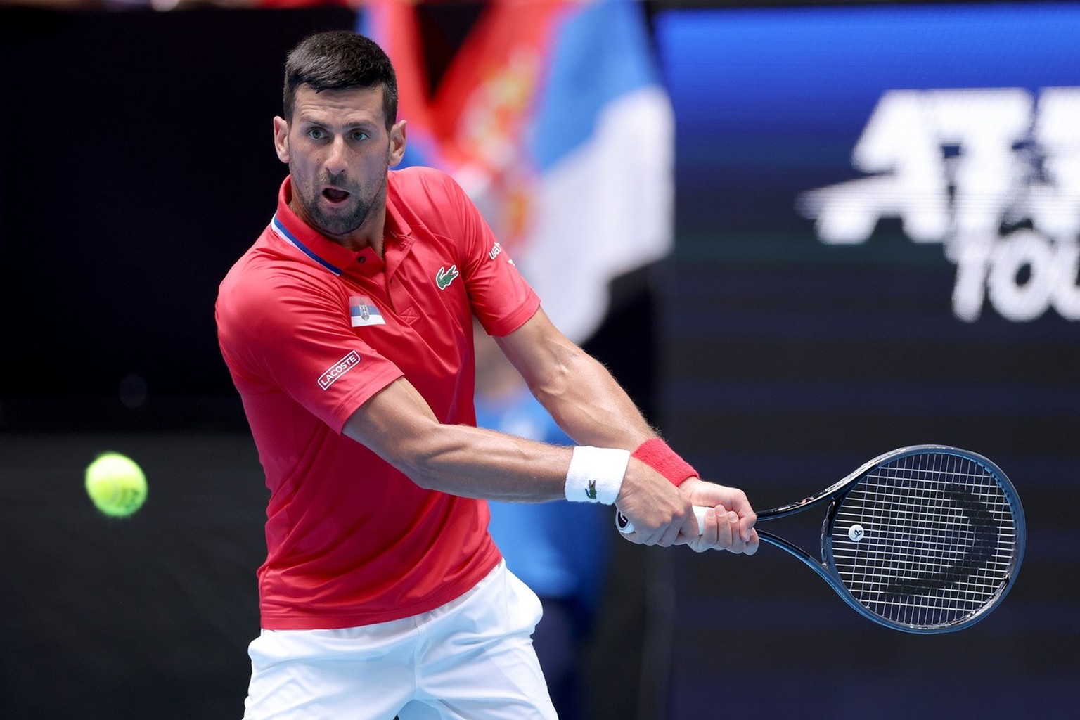 epa11052933 Novak Djokovic of Serbia in action against Jiri Lehecka of the Czech Republic during their group stage match of the 2024 United Cup at RAC Arena in Perth, Australia, 02 January 2024. EPA/R ...