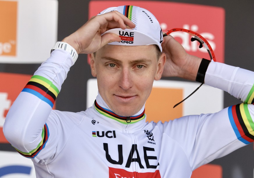 epa12915292 First placed Slovenian rider Tadej Pogacar of team UAE Team Emirates XRG poses on the podium after the Liege Bastogne Liege one-day cycling race over 259.5km from Liege to Liege, Belgium,  ...