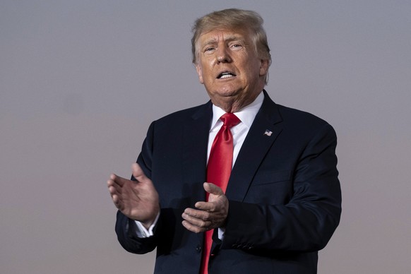FILE - Former President Donald Trump prepares to take the stage during a rally in Perry, Ga., on Sept. 25, 2021. The New York attorney generalÄôs office says its civil investigation has uncovered evi ...