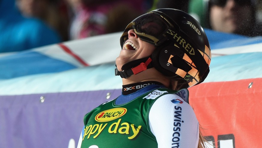 epa05597632 Lara Gut of Switzerland celebrates her victoy after the second run of the women&amp;#039;s Giant Slalom race of the FIS Alpine Ski World Cup season on the Rettenbach glacier, in Soelden, A ...