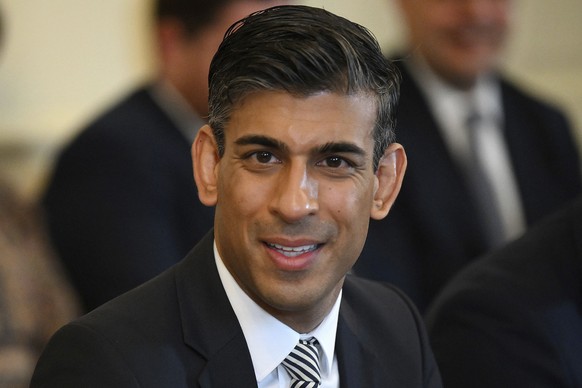 FILE - Britain&#039;s Chancellor of the Exchequer Rishi Sunak attends a cabinet meeting at 10 Downing Street, London, May 24, 2022. Britain���s Conservative Party will choose two finalists on Wednesda ...