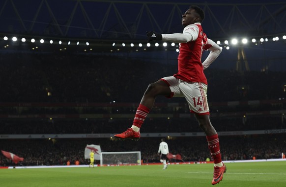 Arsenal&#039;s Eddie Nketiah celebrates after scoring his side&#039;s opening goal during the English Premier League soccer match between Arsenal and Manchester United at Emirates stadium in London, S ...
