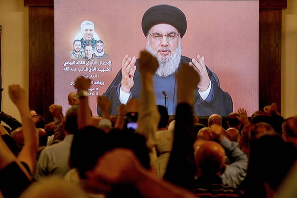 June 19, 2024, Beirut, Beirut, Lebanon: Pro-Iranian Hezbollah Secretary General Hassan Nasrallah in a speech to his supporters during a mass rally to mark one week of the assassination of top party co ...