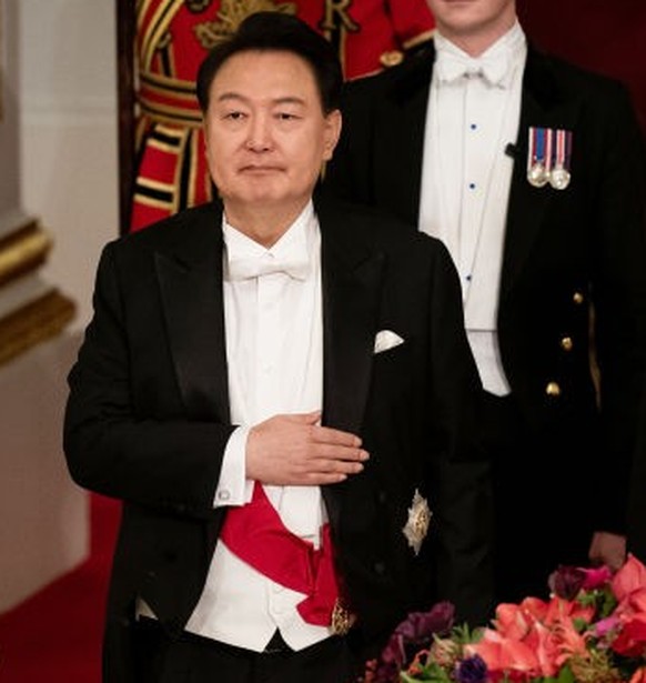 South Korean President state visit to the UK President of South Korea Yoon Suk Yeol listens as King Charles III speaks at the state banquet at Buckingham Palace, London, for the state visit to the UK  ...