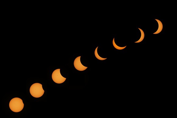 epa11266538 A combination of photographs shows the phases of the solar eclipse in Guadalajara, Jalisco, Mexico, 08 April 2024. The North American Solar eclipse totality was visible in parts of Mexico, ...