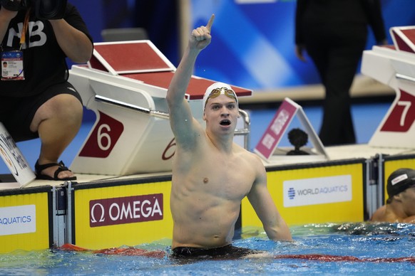 Leon Marchand, of France, reacts after competing in the men&#039;s 400m individual medley final at the World Swimming Championships in Fukuoka, Japan, Sunday, July 23, 2023. Marchand set a new world r ...