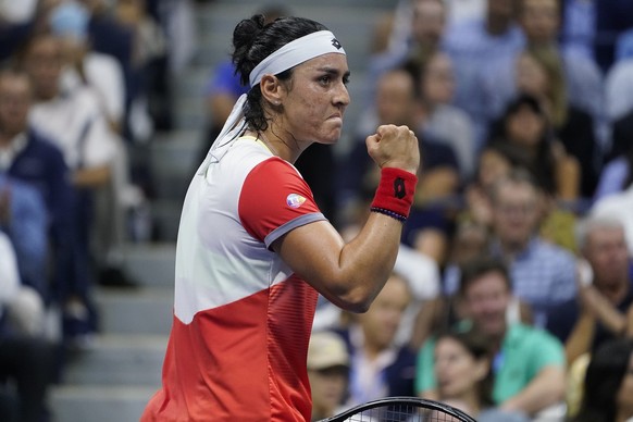 Ons Jabeur, of Tunisia, reacts after defeating Caroline Garcia, of France, during the semifinals of the U.S. Open tennis championships, Thursday, Sept. 8, 2022, in New York. (AP Photo/John Minchillo)