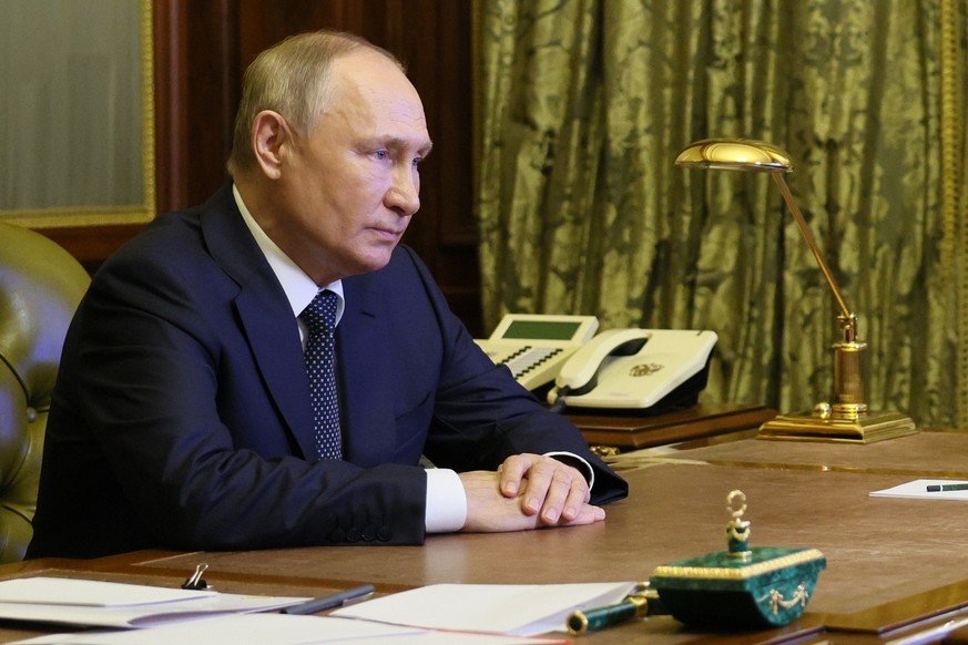 Russian President Vladimir Putin chairs a Security Council meeting via videoconference in St. Petersburg, Russia, Monday, Oct. 10, 2022. (Gavriil Grigorov, Sputnik, Kremlin Pool Photo via AP)