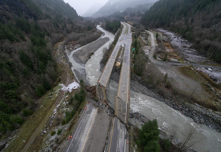 In this aerial photo, damage caused by heavy rains and mudslides earlier in the week is pictured along the Coquihalla Highway near Hope, British Columbia, Thursday, Nov. 18, 2021. (Jonathan Hayward/Th ...