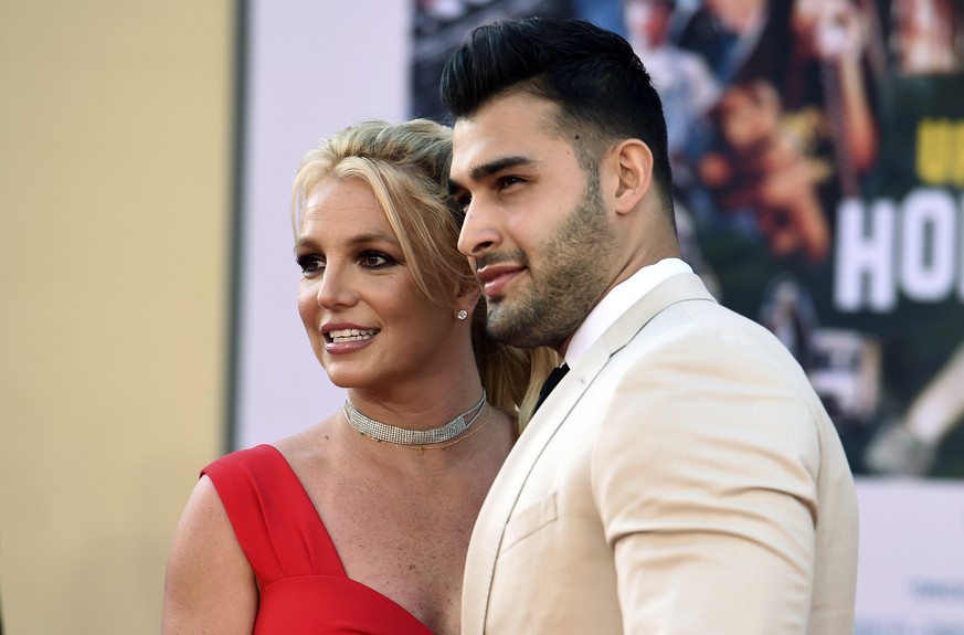 FILE - Britney Spears and Sam Asghari arrive at the Los Angeles premiere of &quot;Once Upon a Time in Hollywood,&quot; at the TCL Chinese Theatre, Monday, July 22, 2019. Spears and her partner Asghari ...