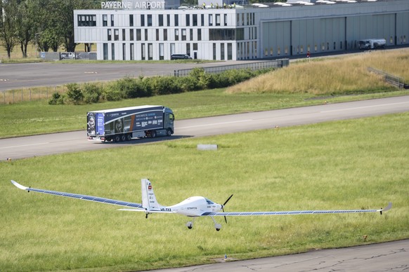 SolarStratos, a solar powered aircraft prototype, flown by Swiss adventurer Raphael Domjan in a race between an electric truck and the Solar Stratos aircraft on the runway at Payerne Airport, Switzerl ...