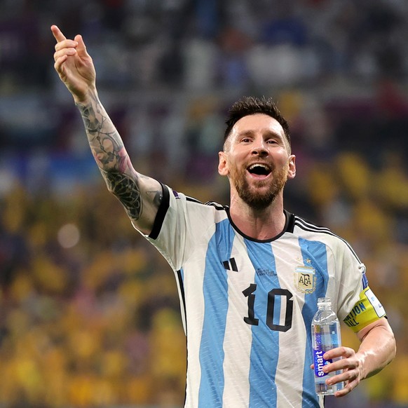 epa10347101 Lionel Messi of Argentina celebrates after winning the FIFA World Cup 2022 round of 16 soccer match between Argentina and Australia at Ahmad bin Ali Stadium in Doha, Qatar, 03 December 202 ...