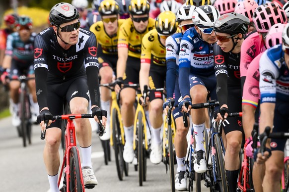 Joel Suter from Switzerland of Tudor Cycling team, left, and Yannis Voisard from Switzerland of Tudor Cycling team, right, and the pack in action during the first stage, a 170,9 km race between Crissi ...