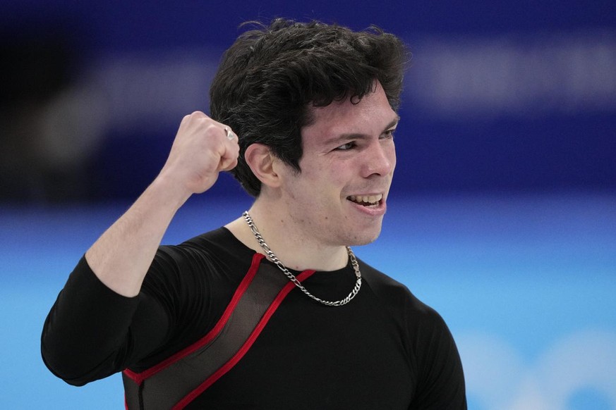 Keegan Messing, of Canada, competes during the men&#039;s short program figure skating competition at the 2022 Winter Olympics, Tuesday, Feb. 8, 2022, in Beijing. (AP Photo/Bernat Armangue)