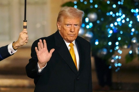 PARIS, FRANCE - DECEMBER 07: President-Elect, Donald Trump waves to the press after meeting French president Emmanuel Macron at the Elysee palace on December 07, 2024 in Paris, France. Donald Trump wa ...