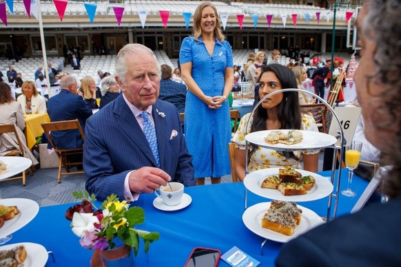 LONDON, ENGLAND - JUNE 05: Prince Charles, Prince Of Wales, greets attendees during a Big Jubilee Lunch at The Oval on June 5, 2022 in London, England. The Platinum Jubilee of Elizabeth II is being ce ...