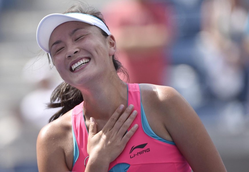 epa04381228 Shuai Peng of China reacts after defeating Belinda Bencic of Switzerland during their quarterfinals match on the ninth day of the 2014 US Open Tennis Championship at the USTA National Tenn ...