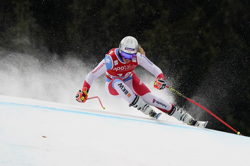 Switzerland&#039;s Corinne Suter competes during an alpine ski, women&#039;s World Cup downhill training session in Garmish Partenkirchen, Germany, Friday, Jan. 28, 2022. (AP Photo/Marco Tacca)