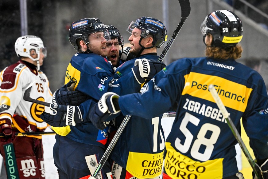 Christopher Tierney (HCAP) left celebrates his goal with Christopher DiDomenico (HCAP), Dominic Zwerger (HCAP) and Jesse Zgraggen (HCAP), during the regular season National League game between HC Ambr ...