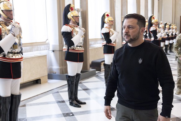 epa10624647 A handout picture made available by the Quirinal Presidential Palace (Palazzo del Quirinale) Press Office shows Ukrainian President Volodymyr Zelensky arriving at Quirinale Palace for a me ...