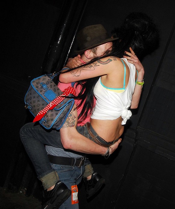 LONDON, UNITED KINGDOM - APRIL 19: Amy Winehouse and Blake Fielder-Civil are seen on April 19, 2007 in London, England. (Photo by Mark Milan/ FilmMagic)