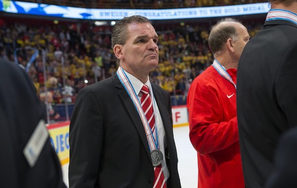 Sean Simpson, head coach of Switzerland national ice hockey team, look dejected after loosing against Sweden in the Gold Medal game between Switzerland and Sweden at the IIHF 2013 Ice Hockey World Cha ...