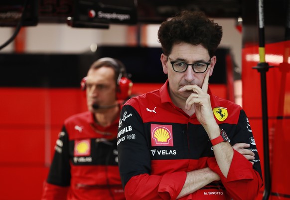 epa10217321 Scuderia Ferrari team principal Mattia Binotto (R) reacts prior to the third practice session of the Singapore Formula One Grand Prix at the Marina Bay Street Circuit, Singapore, 01 Octobe ...