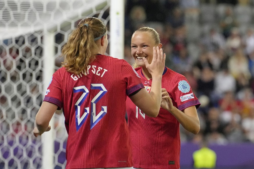 Norway&#039;s Frida Maanum, right, celebrates with Norway&#039;s Signe Gaupset after scoring her side&#039;s third goal during the Euro 2025, group A, soccer match between Norway and Iceland at Arena  ...
