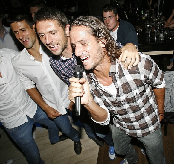 BELGRADE, SERBIA - APRIL 26: Novak Djokovic, Nikola Loncar and Feliciano Lopez sing karaoke at Serbia Open, players party on April 26, 2011 in Belgrade, Serbia. (Photo by Srdjan Stevanovic/Getty Image ...