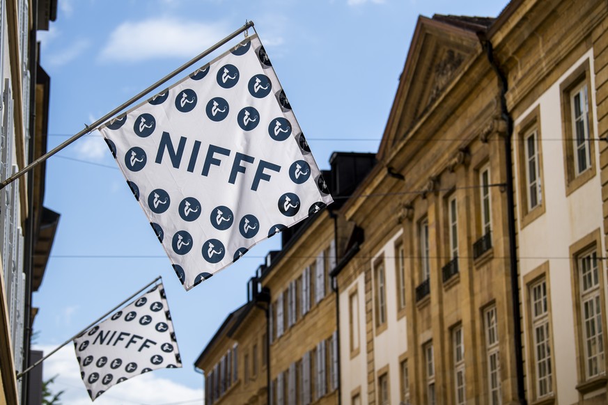 Une vue sur des drapeaux du festival NIFFF, Neuchatel International Fantastique Film Festival, le vendredi 9 juillet 2021 a Neuchatel. (KEYSTONE/Jean-Christophe Bott)