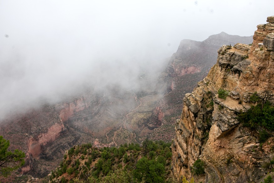 Mist and rain fall over Plateau Point in the Grand Canyon on Aug. 31, 2026, in Grand Canyon National Park, Ariz. (AP Photo/Josh Biggs)
Grand Canyon Flooding