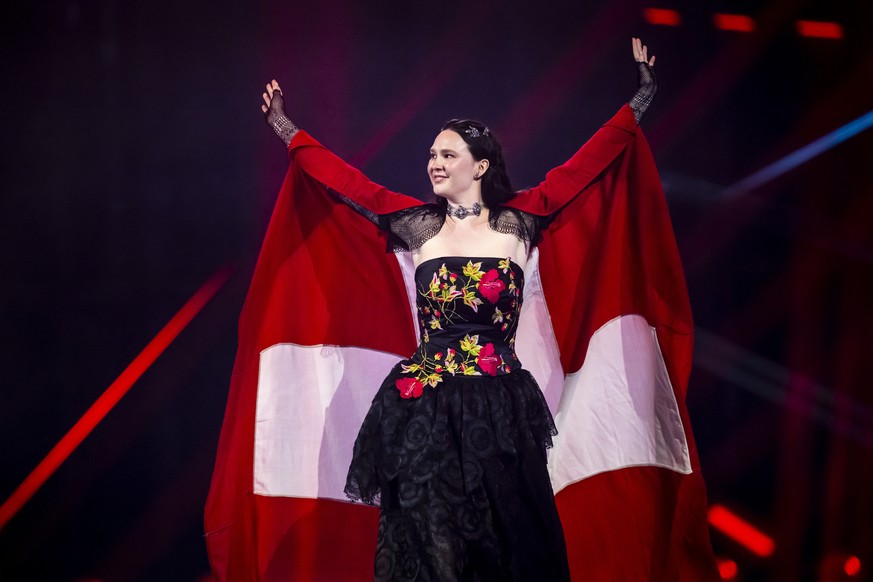 epa12107402 Switzerland&#039;s Zoe Me takes part in the flag parade during the dress rehearsal for the Grand Final of the 69th Eurovision Song Contest (ESC) in Basel, Switzerland, 16 May 2025. EPA/GEO ...