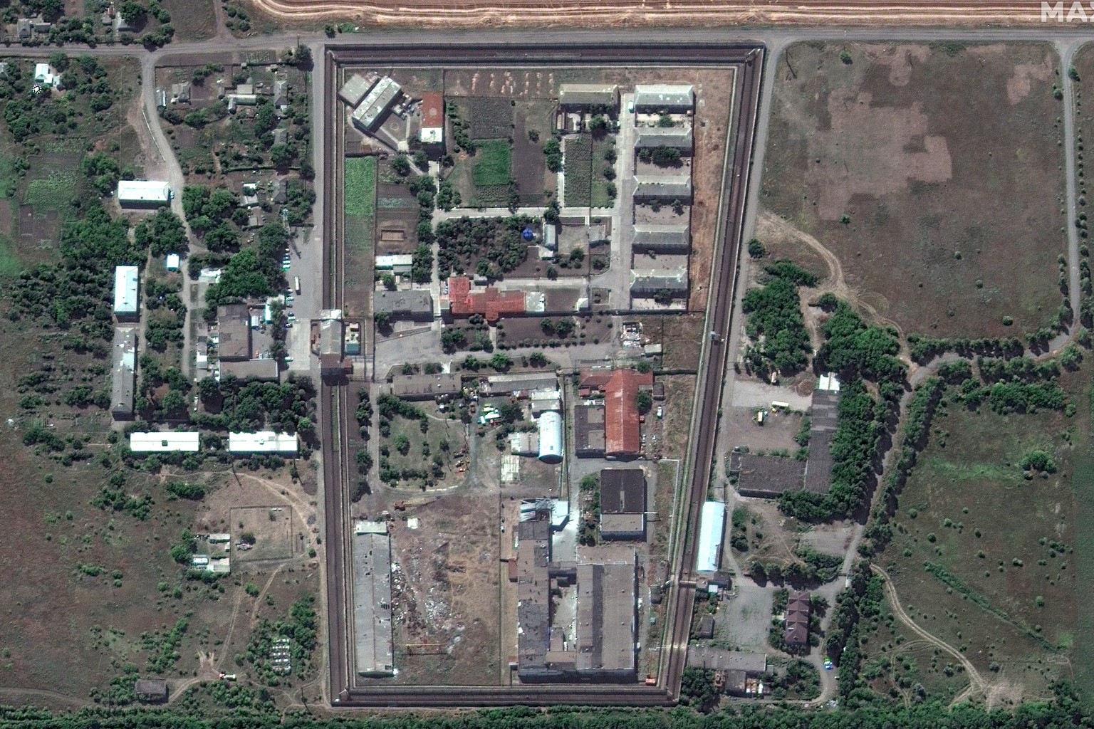 In this satellite photo provided by Maxar Technologies, a view of the Olenivka detention center, in Eastern Donetsk province, after an attack on the prison reportedly killed Ukrainian soldiers capture ...