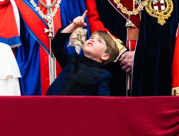 LONDON, ENGLAND - MAY 06: Princess Charlotte of Wales, Catherine, Princess of Wales, Prince Louis of Wales, Prince William, Prince of Wales on the Buckingham Palace balcony during the Coronation of Ki ...