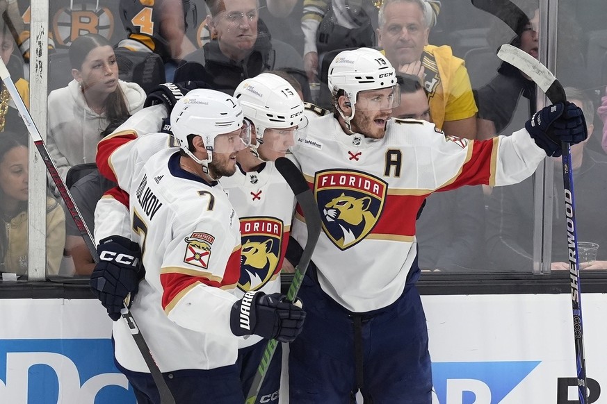 Florida Panthers&#039; Anton Lundell (15) celebrates his goal against the Boston Bruins with Dmitry Kulikov (7) and Matthew Tkachuk (19) during the second period in Game 6 of an NHL hockey Stanley Cup ...