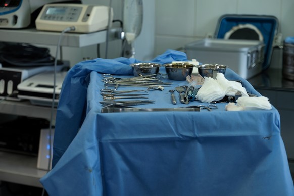 epa12537339 Surgical instruments on a tray in an operating room as reconstructive surgery is performed on a Ukrainian soldier who lost part of his face on the frontline, at the Regional Hospital of Ky ...