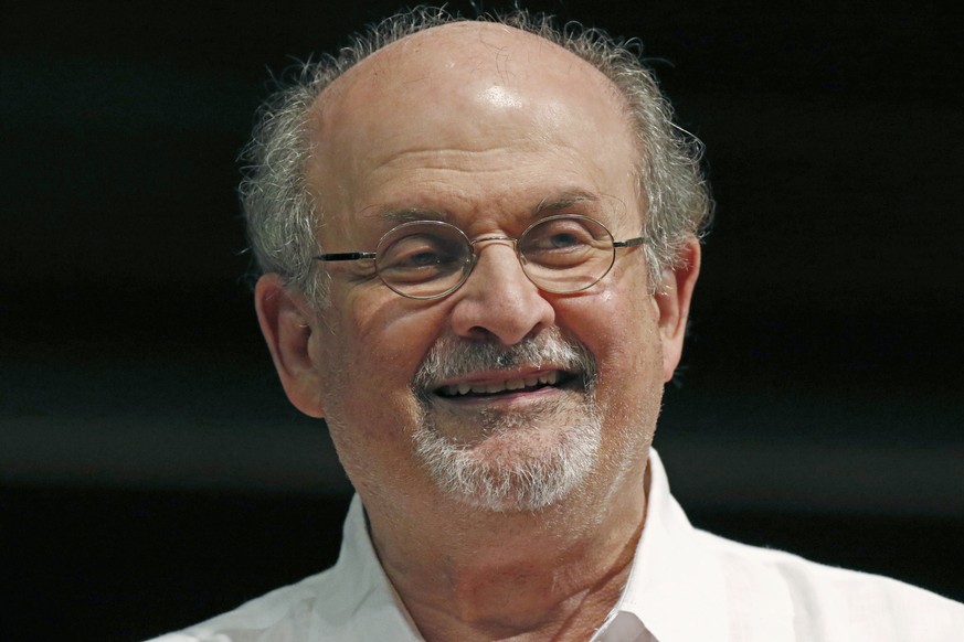 FILE - Author Salman Rushdie appears during the Mississippi Book Festival in Jackson, Miss., on Aug. 18, 2018. Rushdie, whose writing led to death threats, has been attacked on stage at an event in we ...