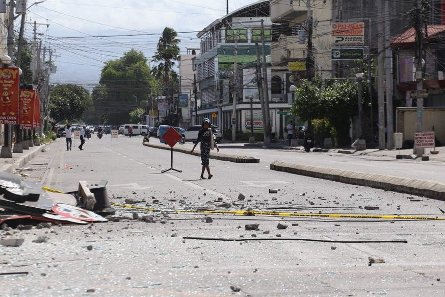 Debris lies on a road after an earthquake in General Santos, Philippines, Monday, June 8, 2026. (AP Photo)