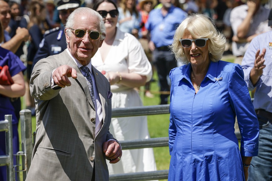 Britain&#039;s King Charles III, left, and Queen Camilla view a sheep dog demonstration during the Premier&#039;s Community BBQ on Tuesday Oct. 22, 2024 in Sydney, Australia. (Brook Mitchell/Pool Phot ...