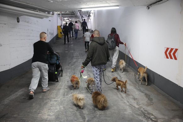 epa12784265 Residents take shelter in the underground parking lot of the Dizingof Center shopping mall in Tel Aviv, Israel, 28 February 2026. The Israeli military reported on 28 February it deteced mi ...