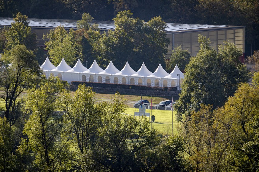epa13199612 A general view shows an area of the Schachen horse racing track following a shooting, in Aarau, Switzerland, 30 August 2026. One person died and five others were injured after shots were f ...