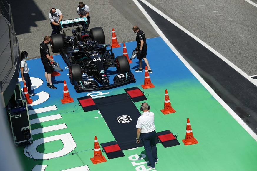 BARCELONA, SPAIN - AUGUST 15: Lewis Hamilton of Great Britain driving the (44) Mercedes AMG Petronas F1 Team Mercedes W11 stops at the weigh bridge during qualifying for the F1 Grand Prix of Spain at  ...