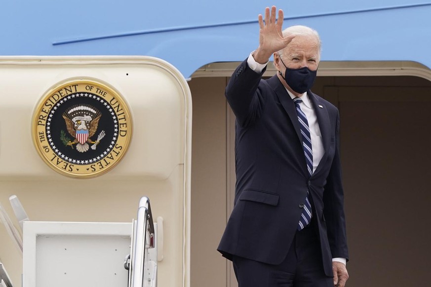 FILE - In this Tuesday, March 16, 2021 file photo, President Joe Biden waves from the top of the steps of Air Force One at Andrews Air Force Base, Md. Russia is to host on Thursday, March 18, 2021, th ...