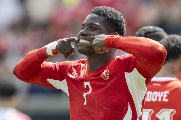 epa13006538 Switzerland's Breel Embolo celebrates after scoring the 1-0 goal during the international friendly soccer match between Switzerland and Jordan, at the kybunpark, in St. Gallen, Switze ...