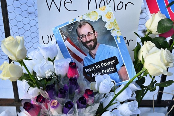 CHICAGO, ILLINOIS - JANUARY 27: Medical workers, union members, and veterans gather for an 'ICE OUT NOW!' rally and memorial for Alex Pretti outside the Jesse Brown VA Medical Center on Janu ...