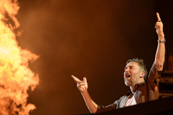 KEYPIX - French DJ David Guetta performs on the main stage of the 30th Venoge Festival in Penthaz, Switzerland, Tuesday, August 11, 2026.(KEYSTONE/Laurent Gillieron)