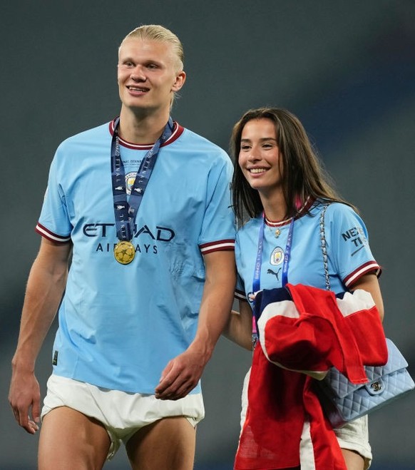 Erling Haaland centre-forward of Manchester City and Norway and Isabel Haugseng Johansen celebrates victory after the UEFA Champions League 2022/23 final match between FC Internazionale and Manchester ...