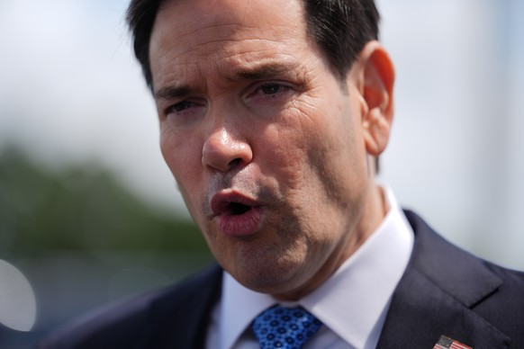 Secretary of State Marco Rubio speaks to the press before boarding his plane at Homestead Air Reserve Base, Thursday, May 21, 2026. Rubio is traveling to a NATO foreign ministers meeting in Sweden. (A ...